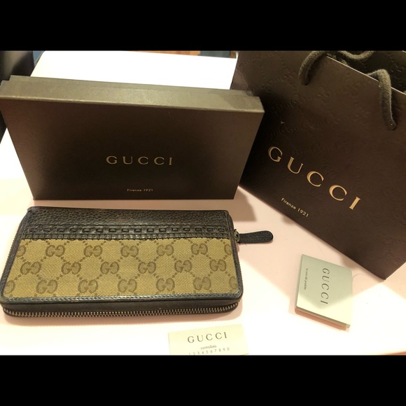 Gucci Handbags - Gucci zip around wallet- 100% authentic